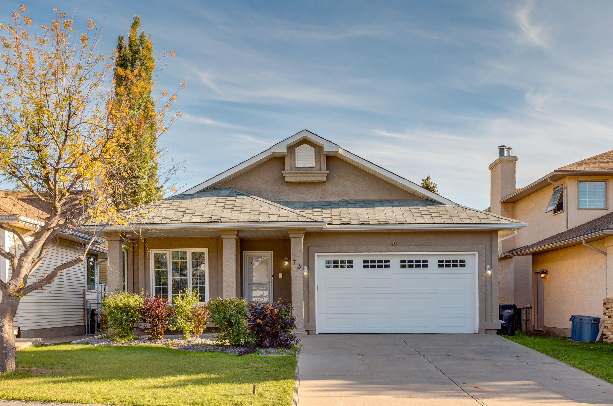 Just Listed: A Walkout Bungalow Backing Onto Green Space in Scenic Acres header image.