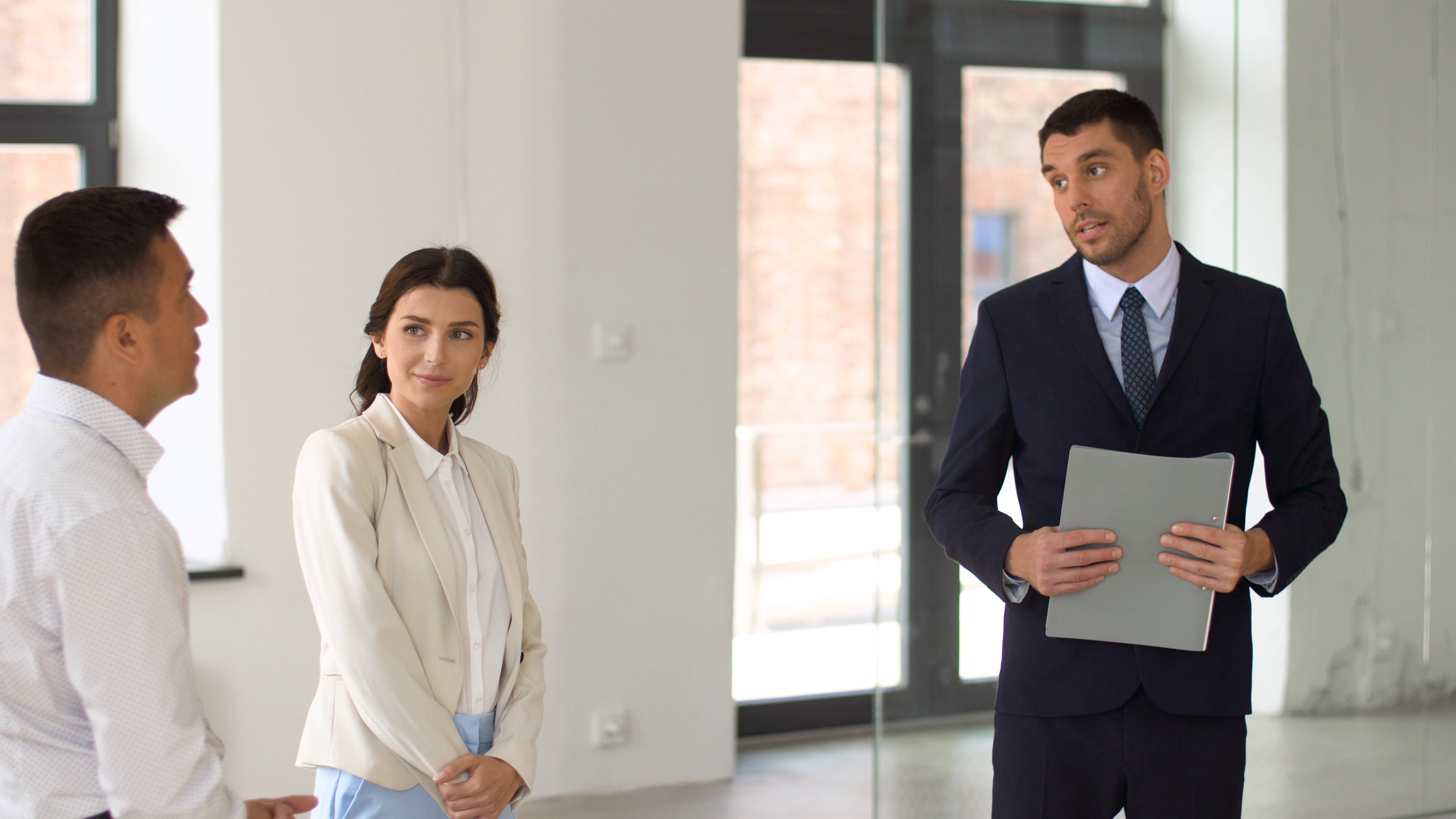 Realtor talking with clients