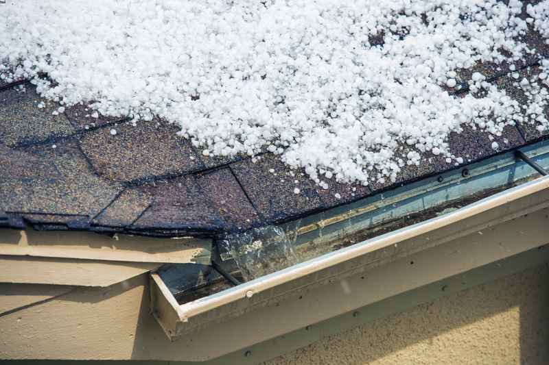 Colorado HOA townhome rooftops after a hailstorm