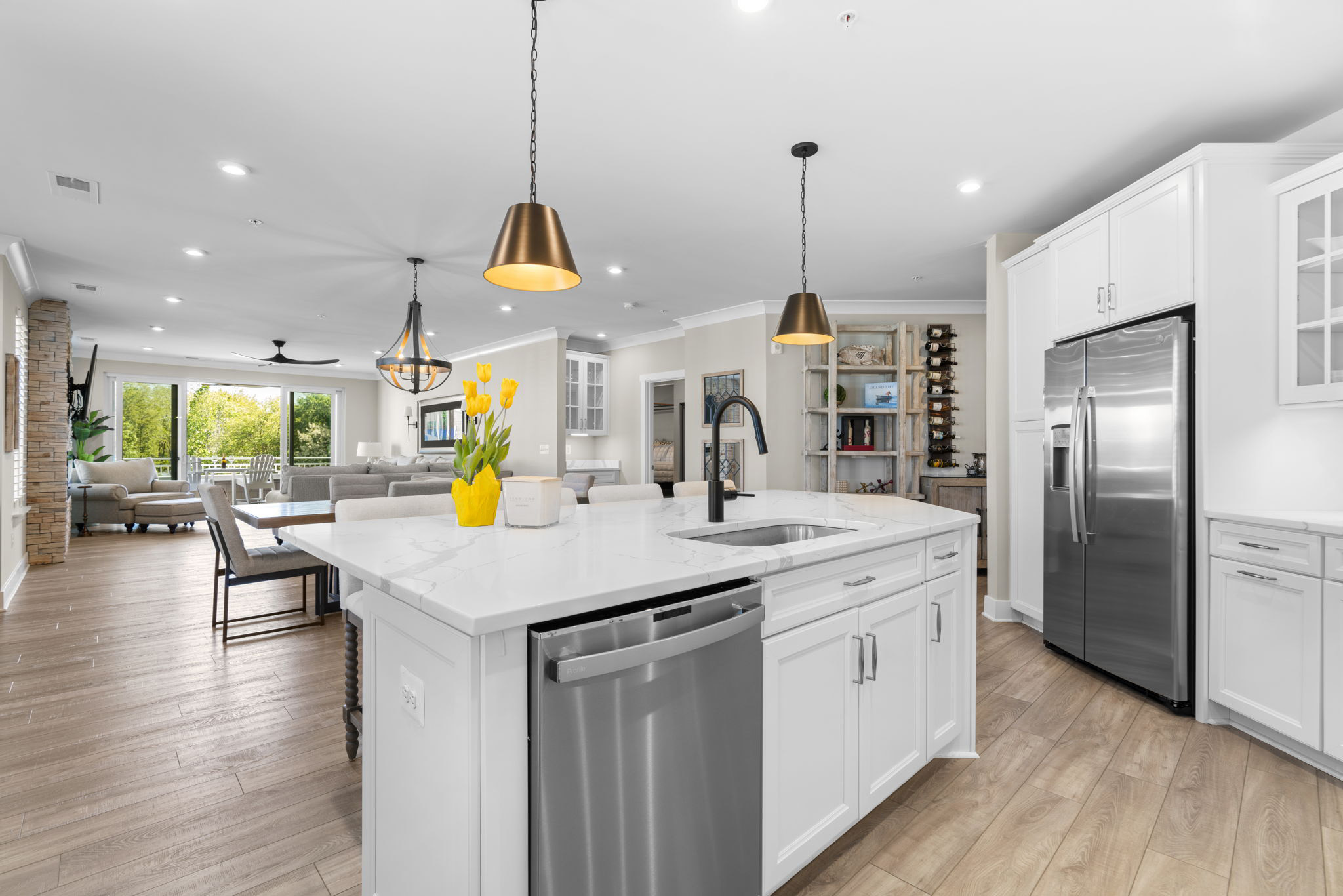 Upgraded white quartz kitchen with oversized island on Kent Island