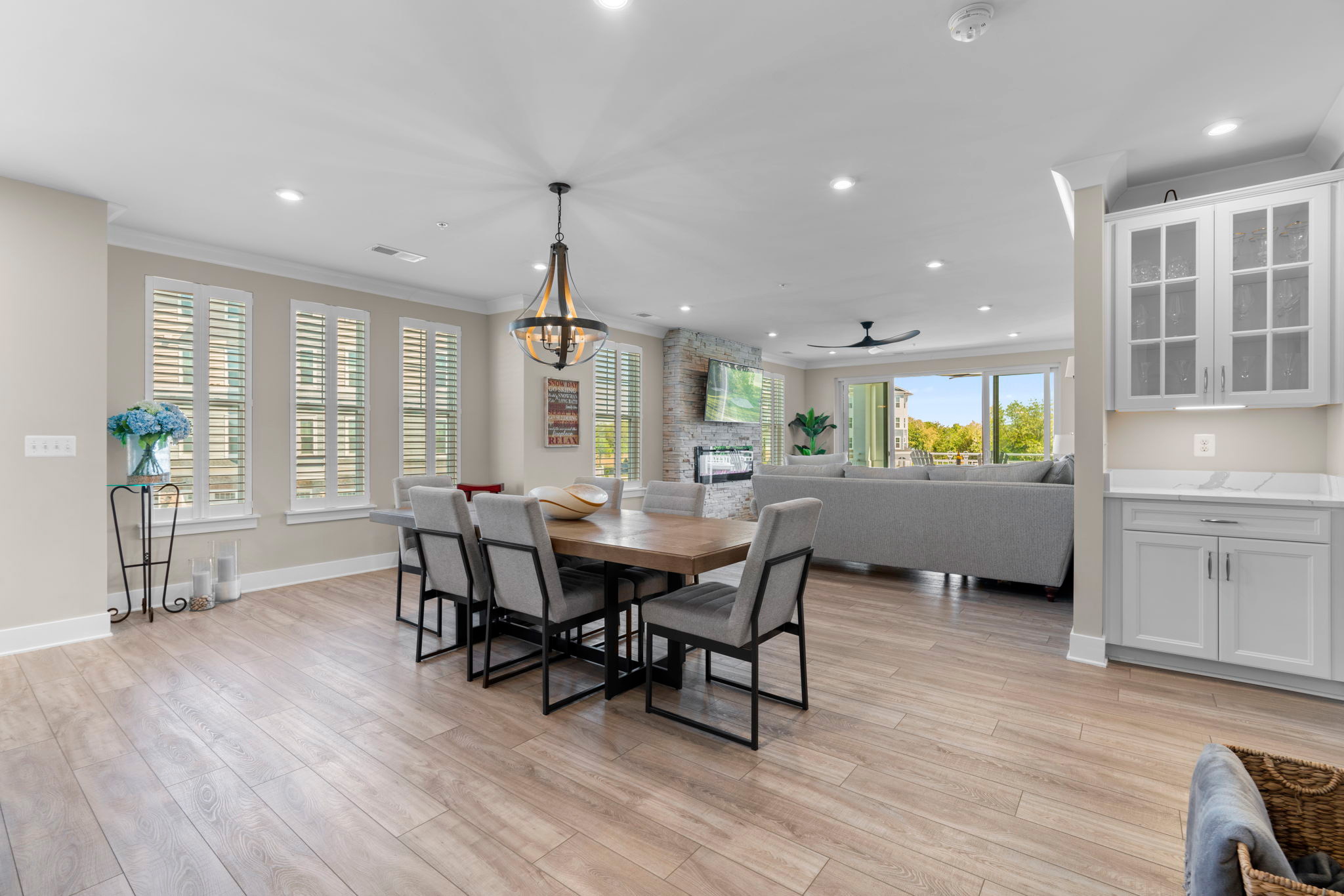 Luxury condo living room with stacked stone fireplace on Kent Island