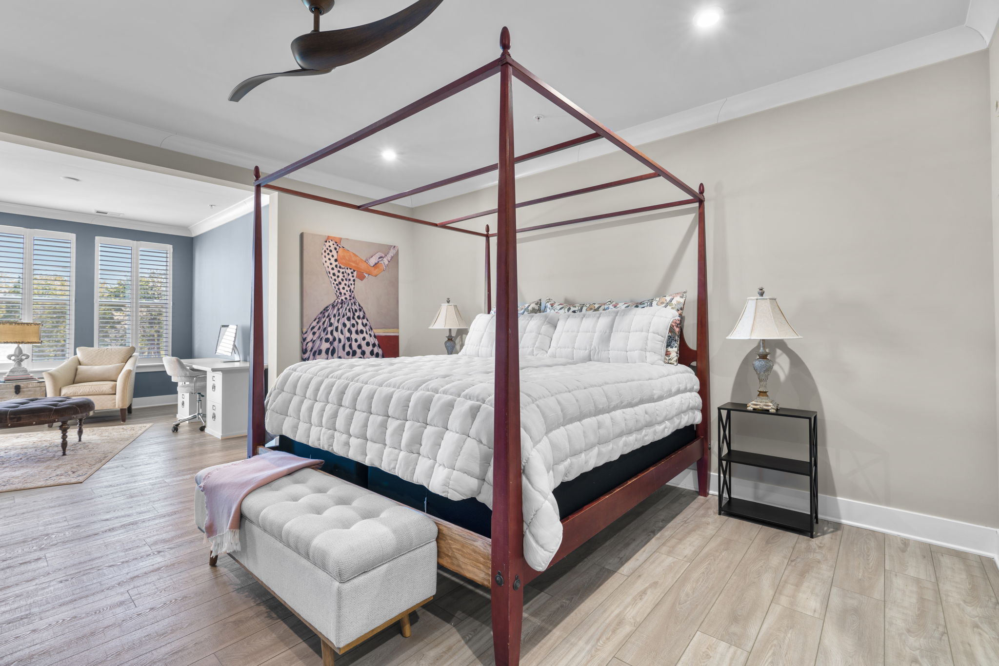 Primary bedroom with sitting room and balcony access overlooking Chester River