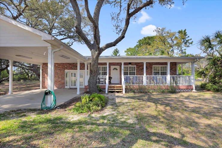 Canal Front Coastal Retreat for Sale in Panacea, FL | Old Florida Living at Its Best header image.