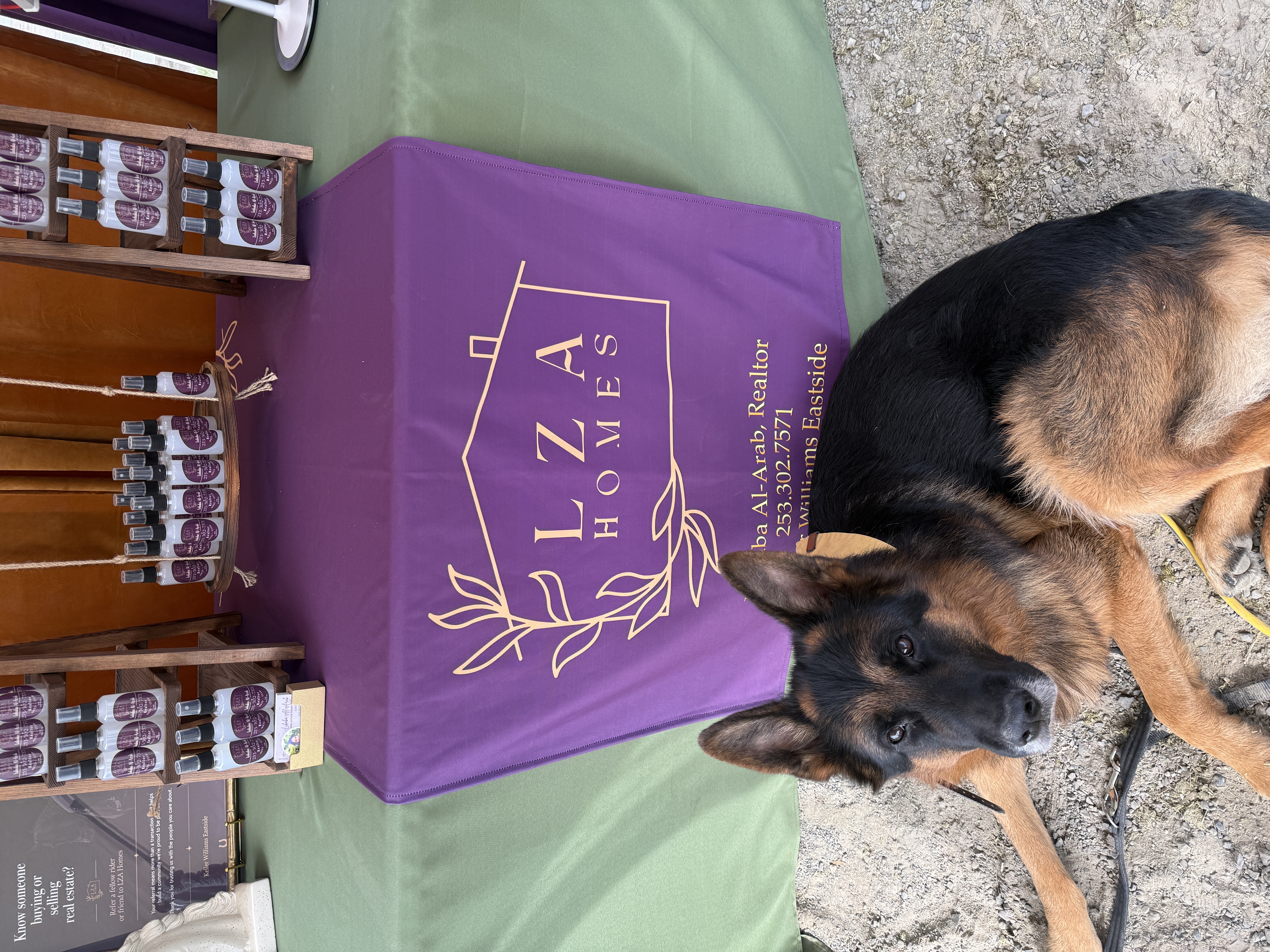 LZA Homes equestrian chic pop-up booth with German Shepherd at WSHJA horse show