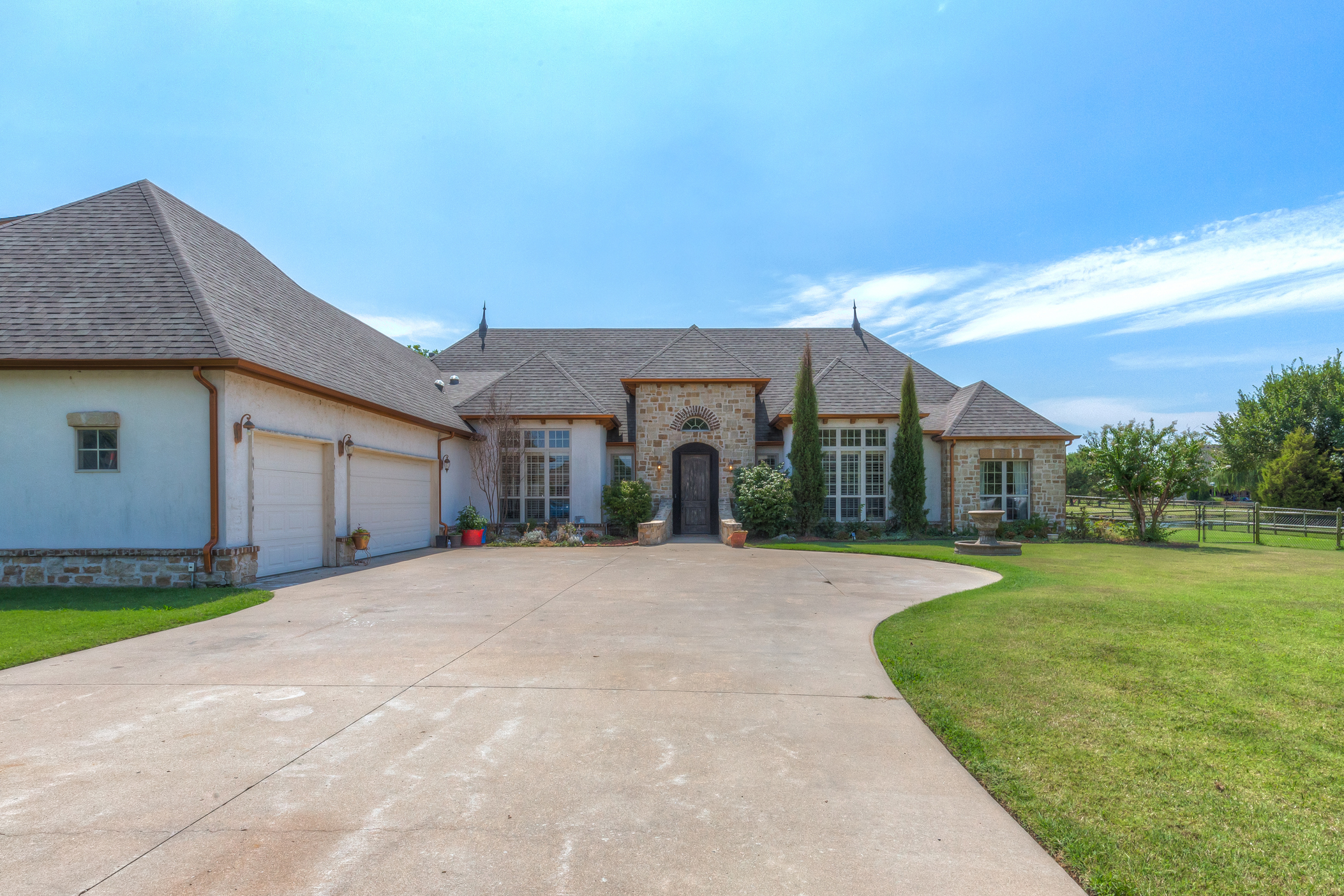 GORGEOUS Custom Home in Owasso! | The Wolek Group | Tulsa Realtor header image.