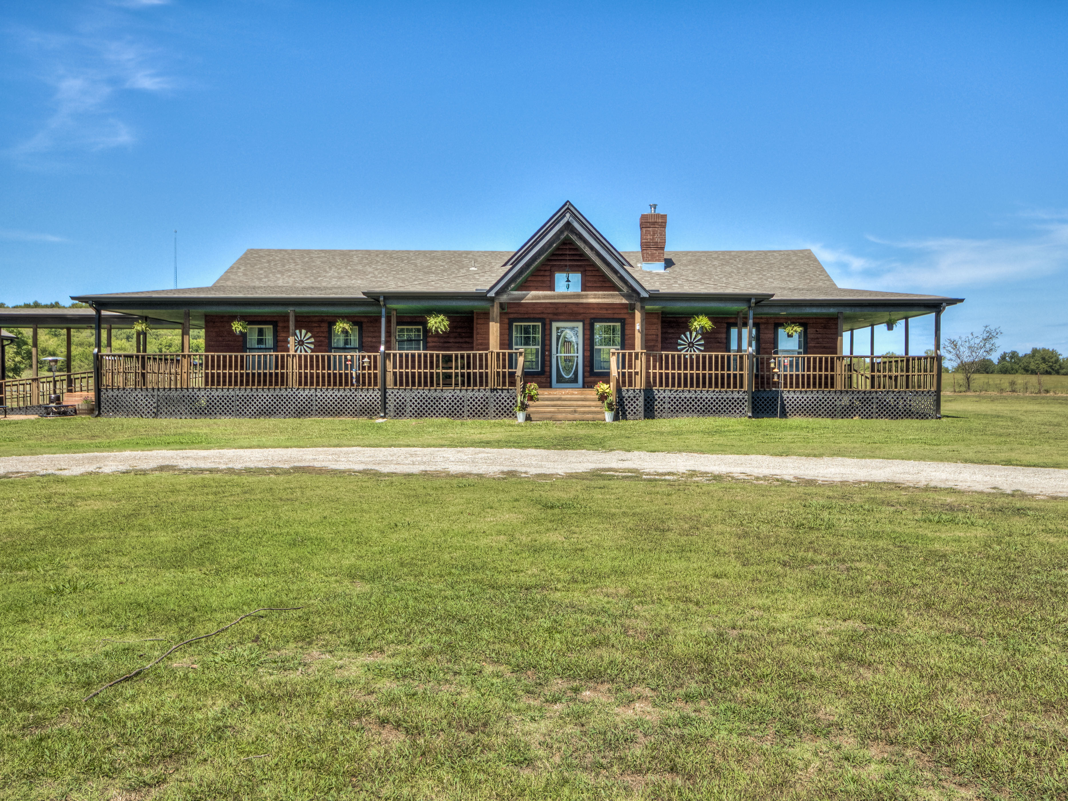 ONE-OF-A-KIND Log Home | The Wolek Group | Tulsa Realtor header image.