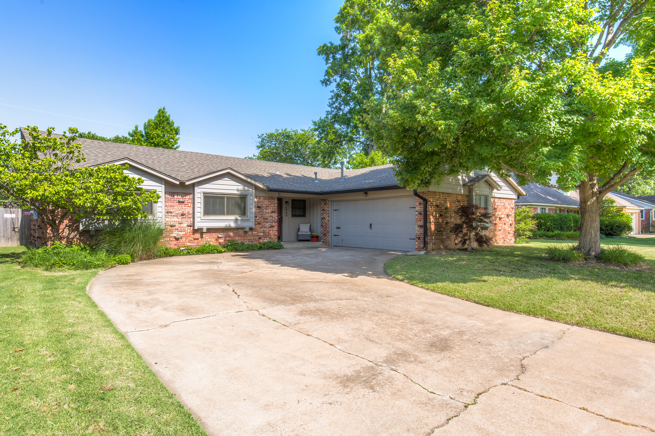 Stylish UPDATES One-Level Home | The Wolek Group | Tulsa Realtor header image.
