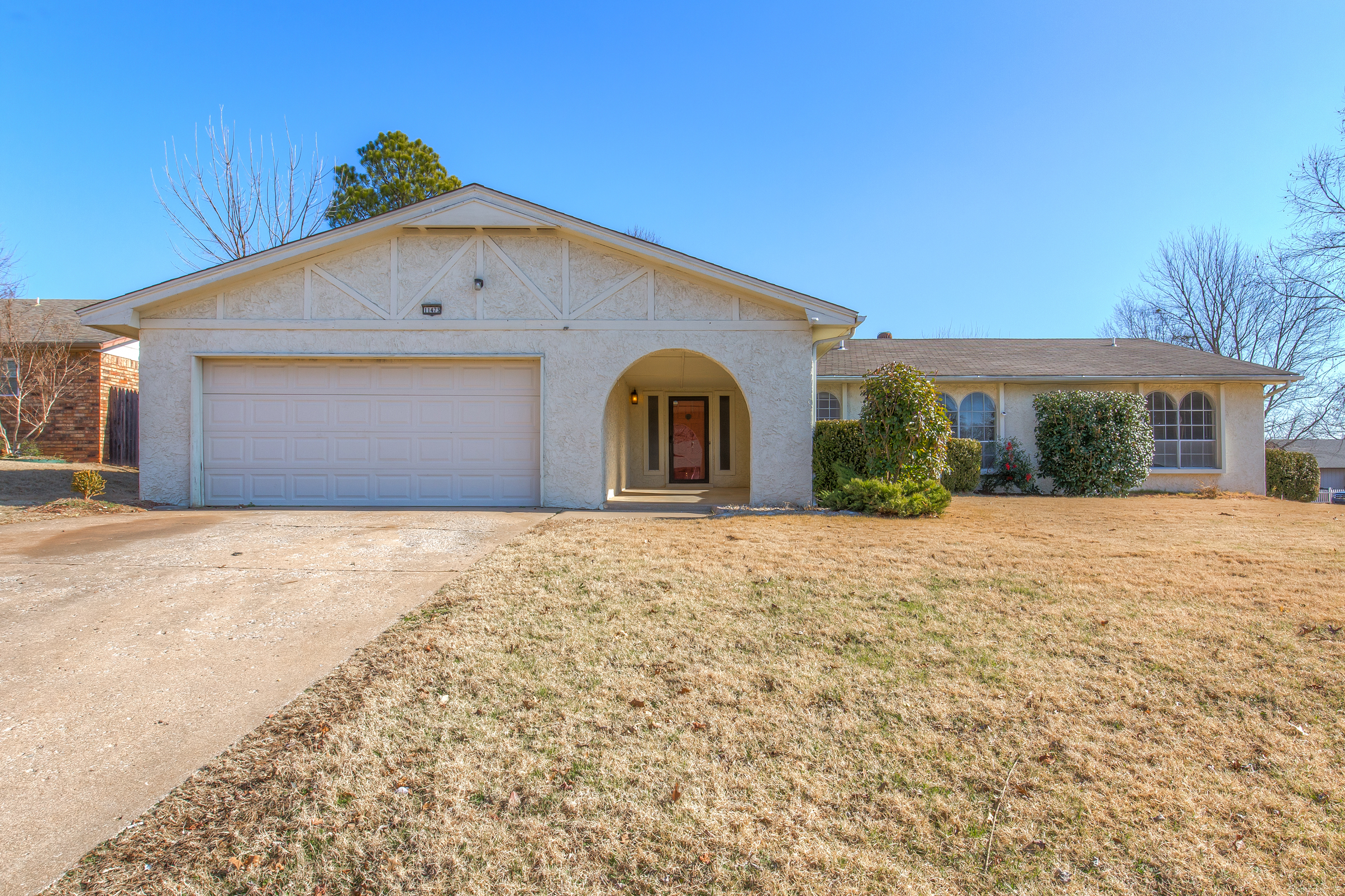 MUST SEE! ONE-OF-A-KIND, UPDATED, ON A LARGE LOT - THE WOLEK GROUP | TULSA REALTOR header image.