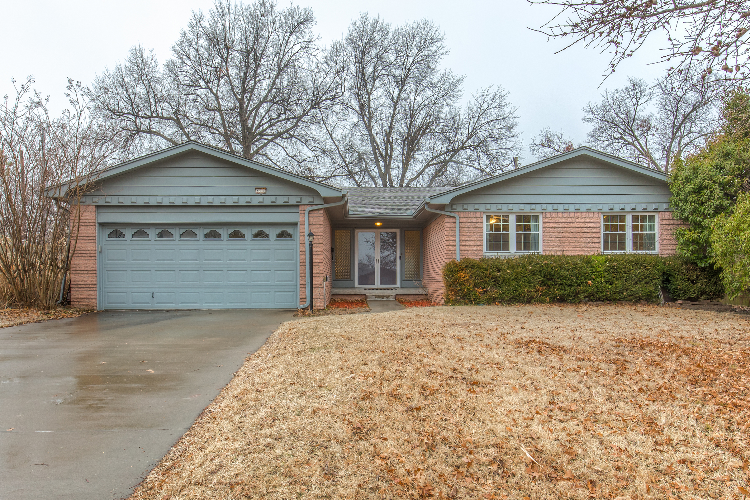 Stylish Updated Home with one-of-a-kind Mid-Century Details! The Wolek Group | Tulsa Real Estate header image.