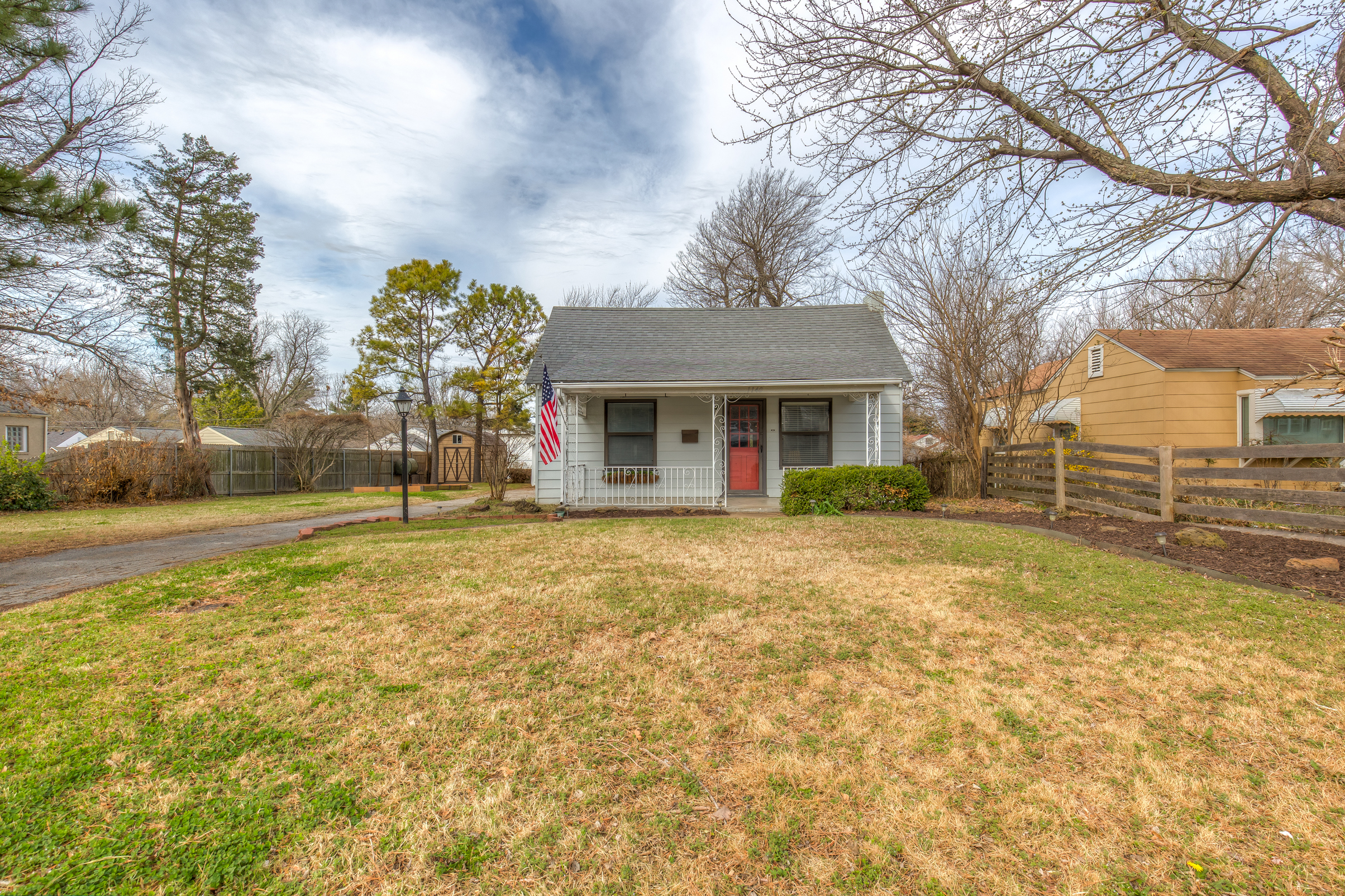MUST SEE! Updated bungalow with expansive, flexible floor plan! The Wolek Group | Tulsa Realtor header image.
