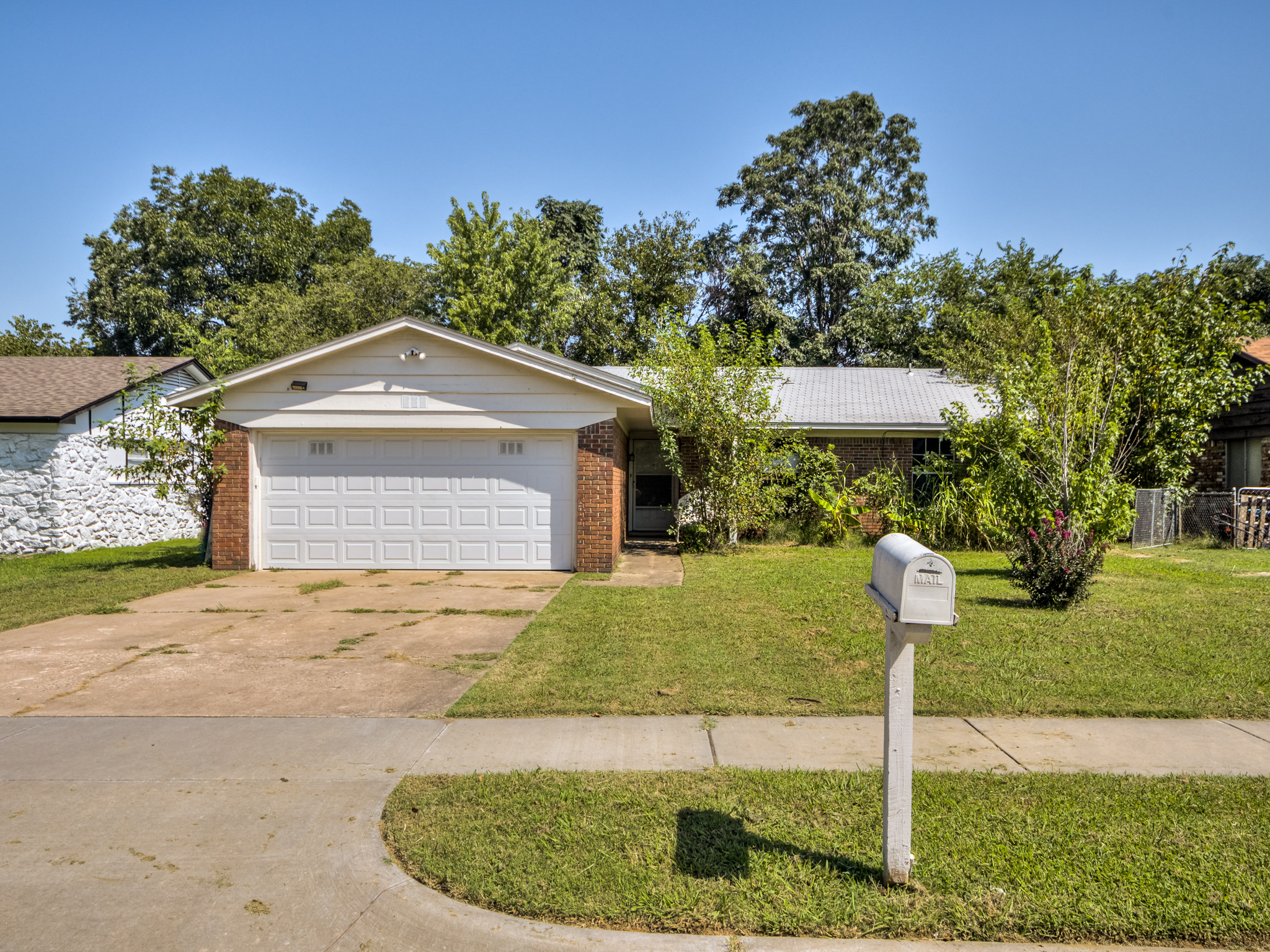 Spacious Brick House | Tulsa Real Estate header image.