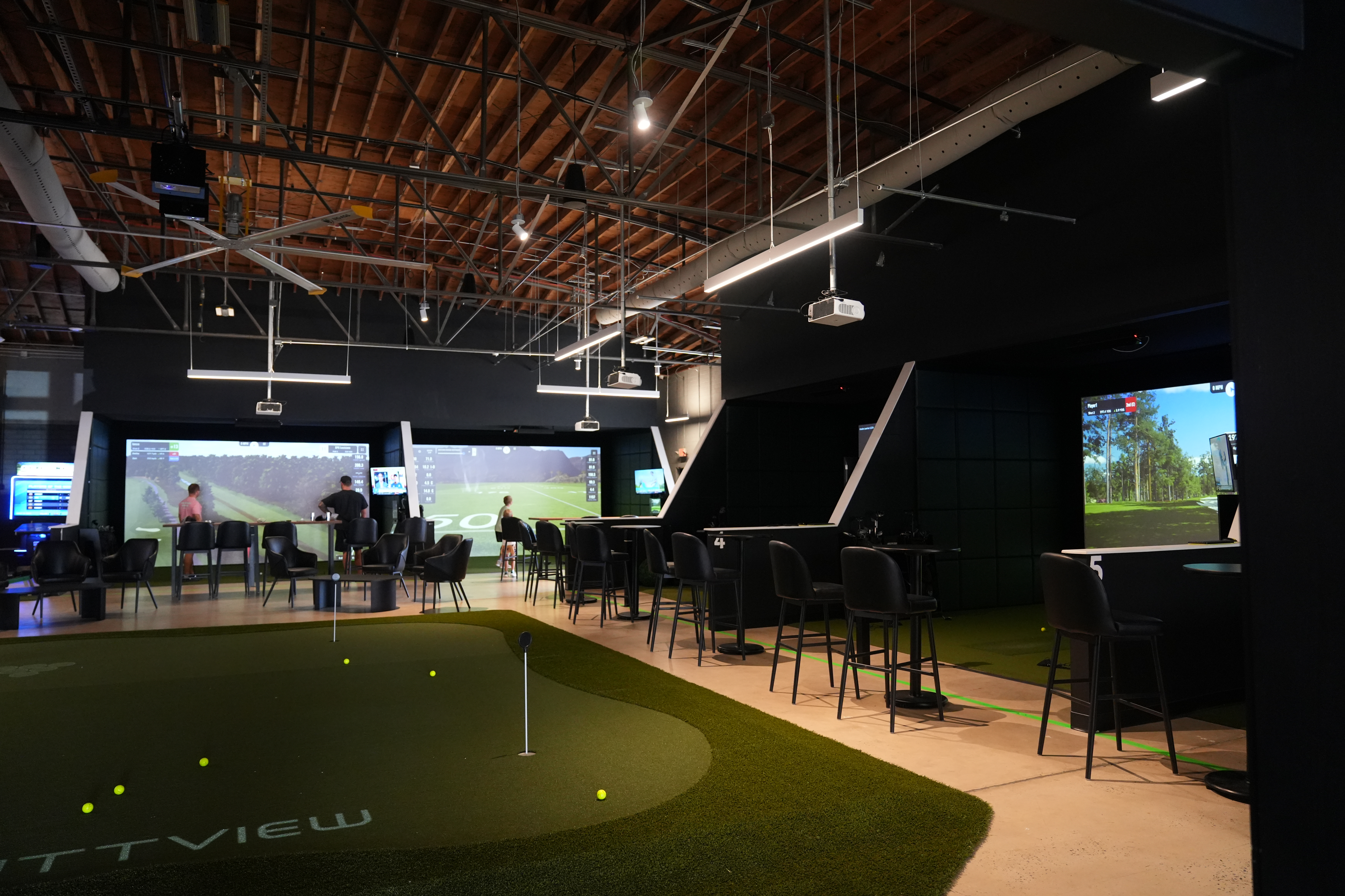 Tap In Opens in LoSo: Charlotte’s Newest Golf-Inspired Social Lounge header image.