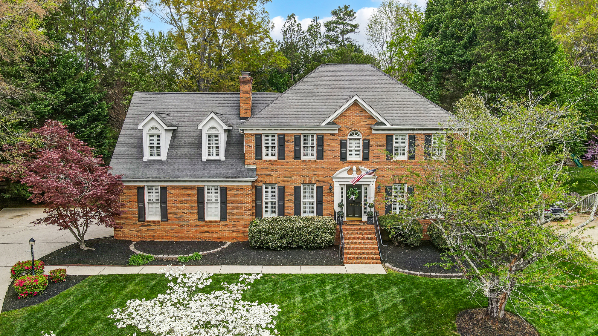 Charming Estate-Style Home Hits the Market with Timeless Details & Incredible Amenities header image.