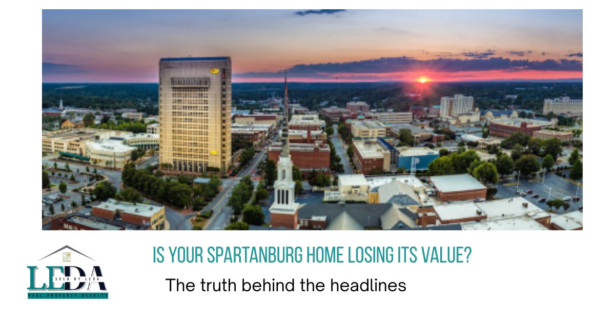 Twilight view of downtown Spartanburg SC skyline featuring the headline 'Is Your Spartanburg Home Losing Value?' with the Sold by Leda Keller Williams logo.