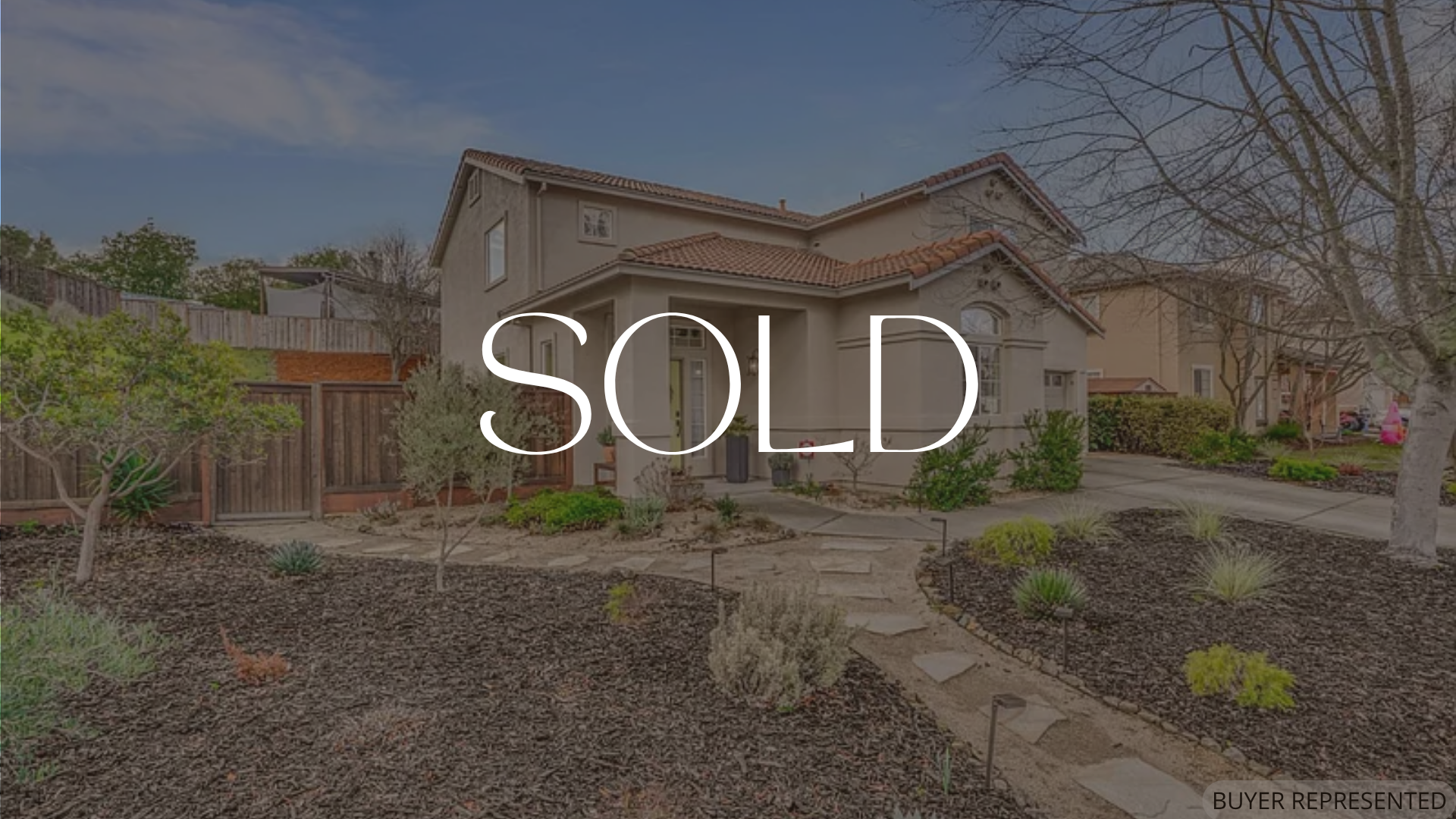 Two-story home in Napa CA with landscaped yard, large lot, and hillside setting near downtown Napa