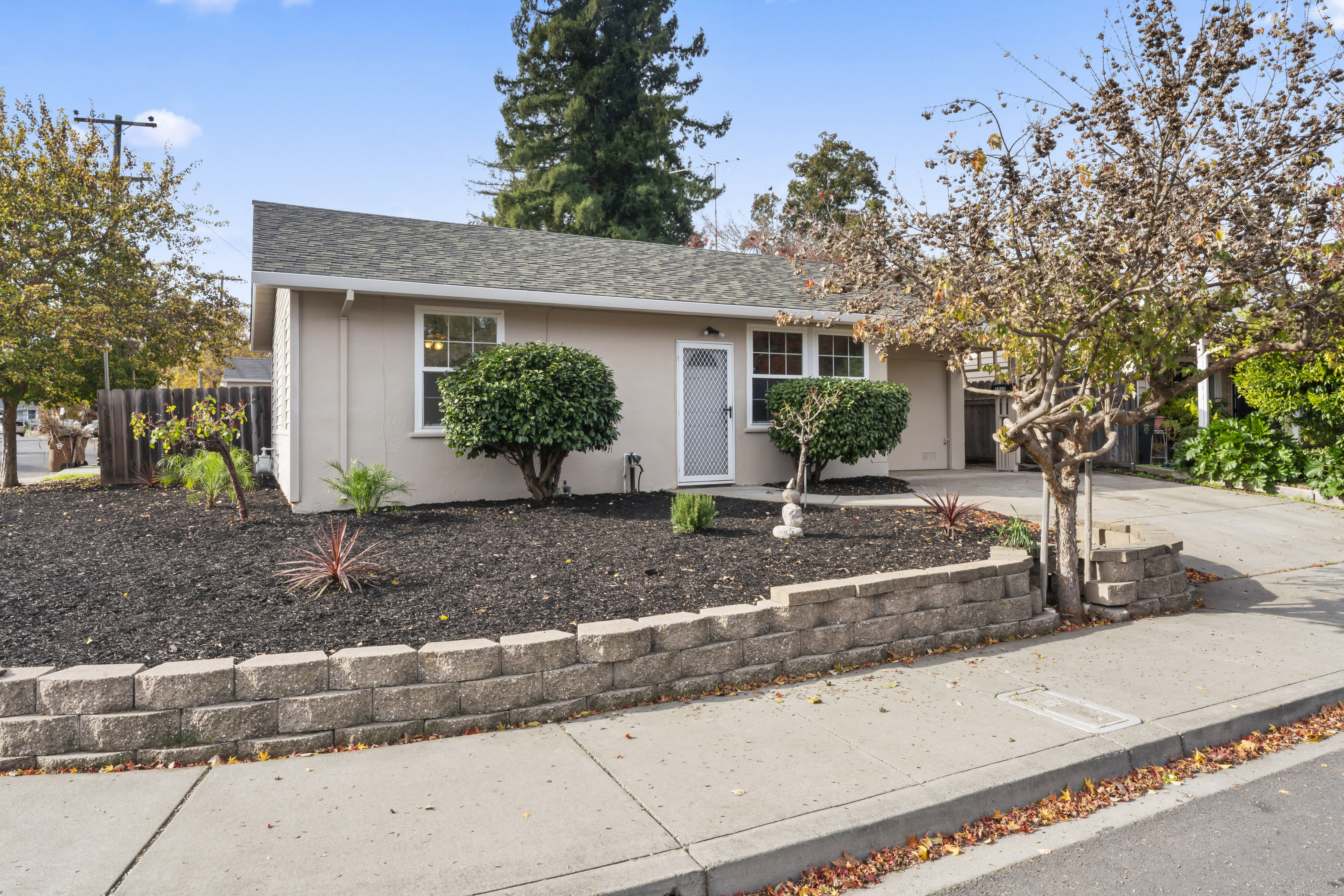 Single-story home recently sold in Napa CA with updated exterior, landscaped yard, and driveway