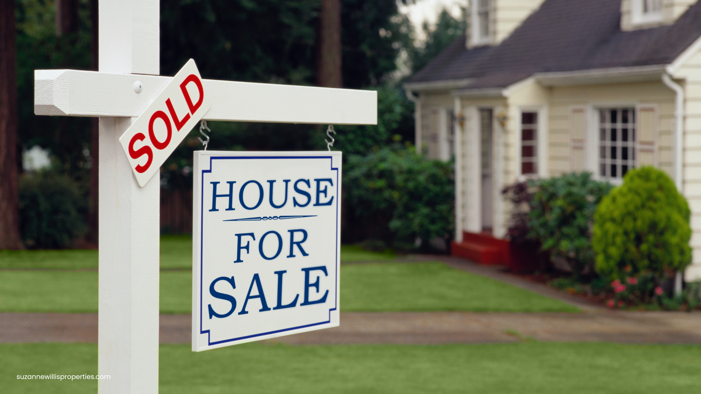 House with Sold Sign