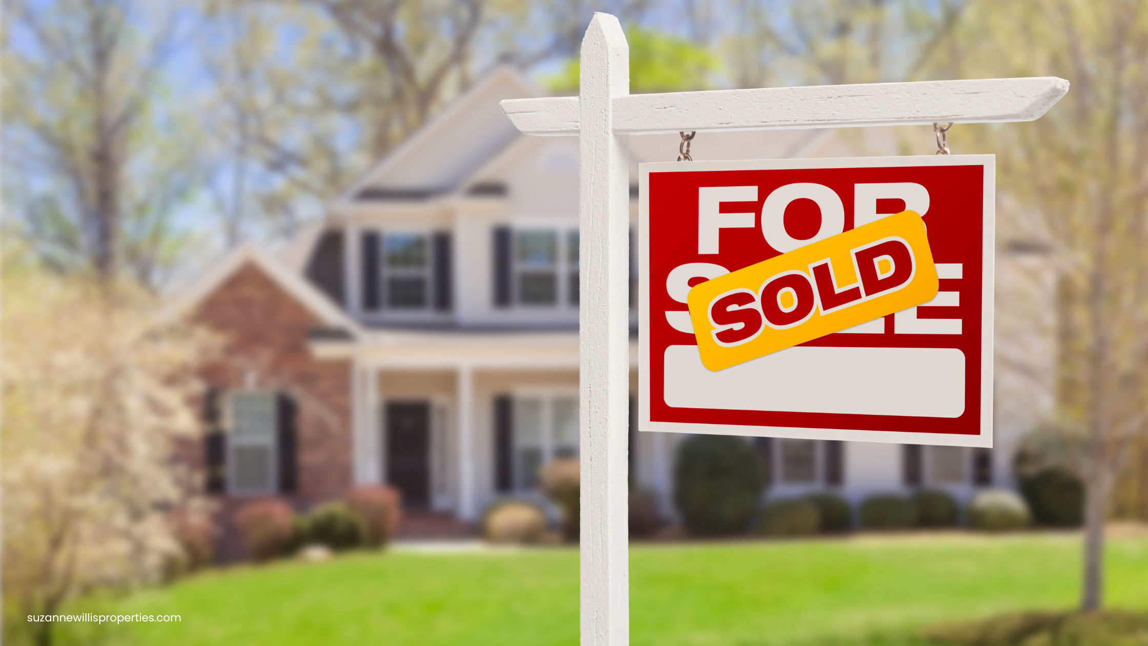 House with Sold Sign