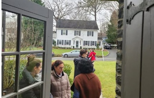 Prospective buyers lined up outside a LuxeLife Real Estate Group open house in New Jersey, illustrating high interest and motivated buyers eager to view the home during the critical first days on the market.