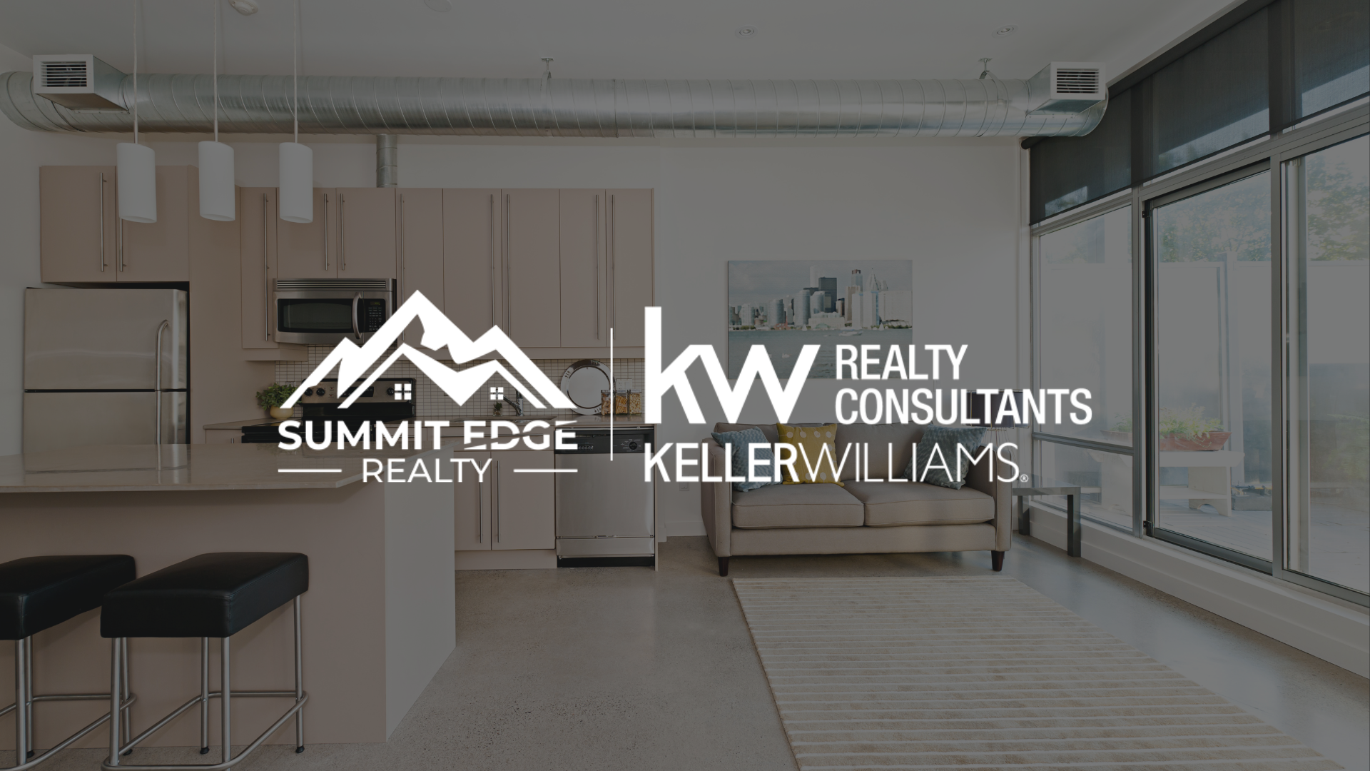 Modern condo living room & kitchen in Louisville, KY with Summit Edge Realty logo in foreground.