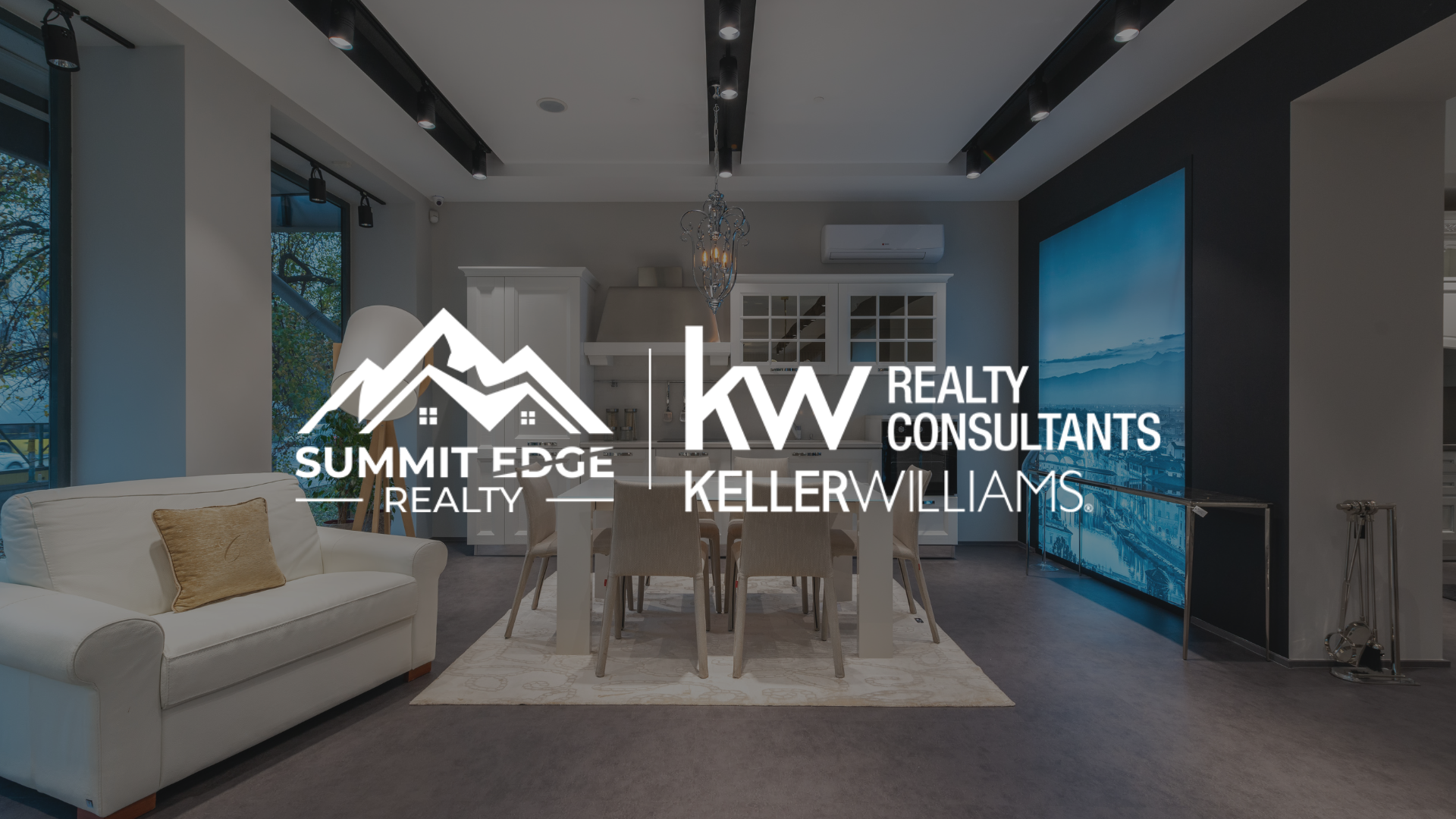Condo living room with Summit Edge Realty logo in foreground.