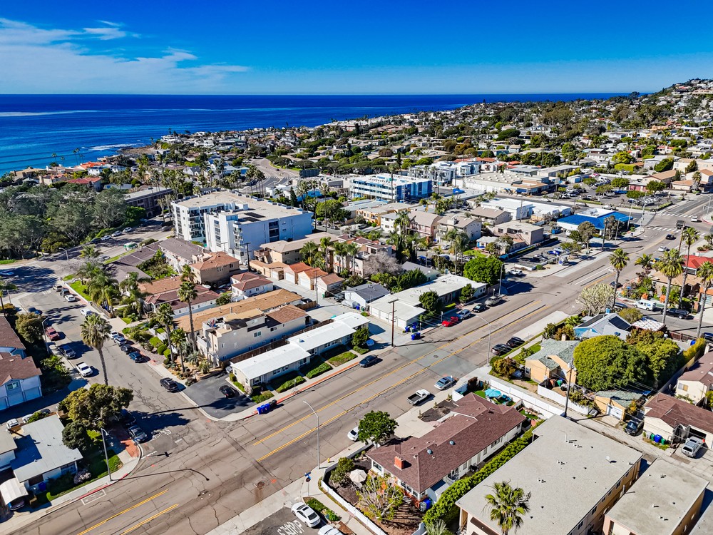 Aerial Photo of North Pacific Beach with ocean and residences