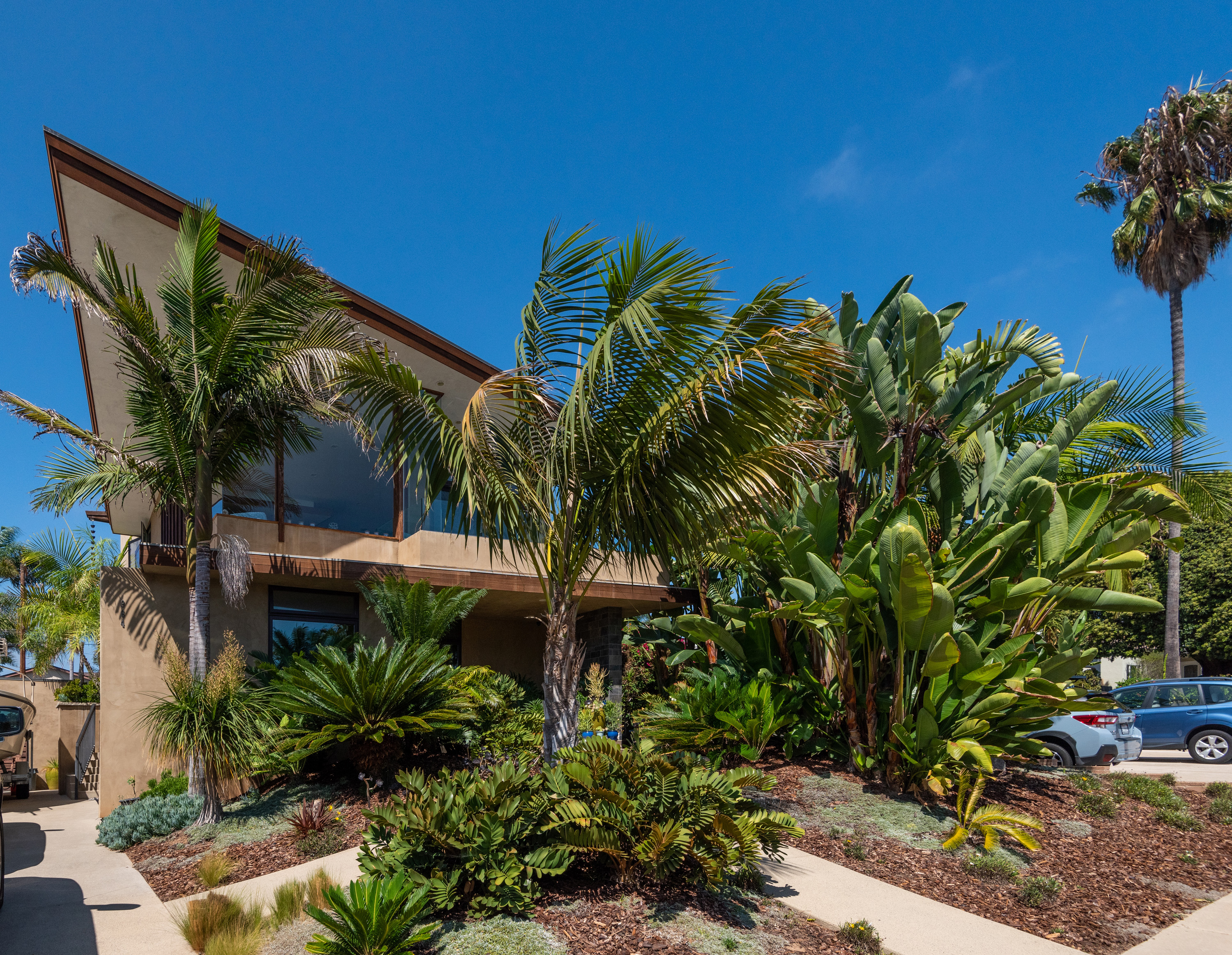 Pacific Beach home with tropical landscaping and ocean-view upper deck, San Diego real estate