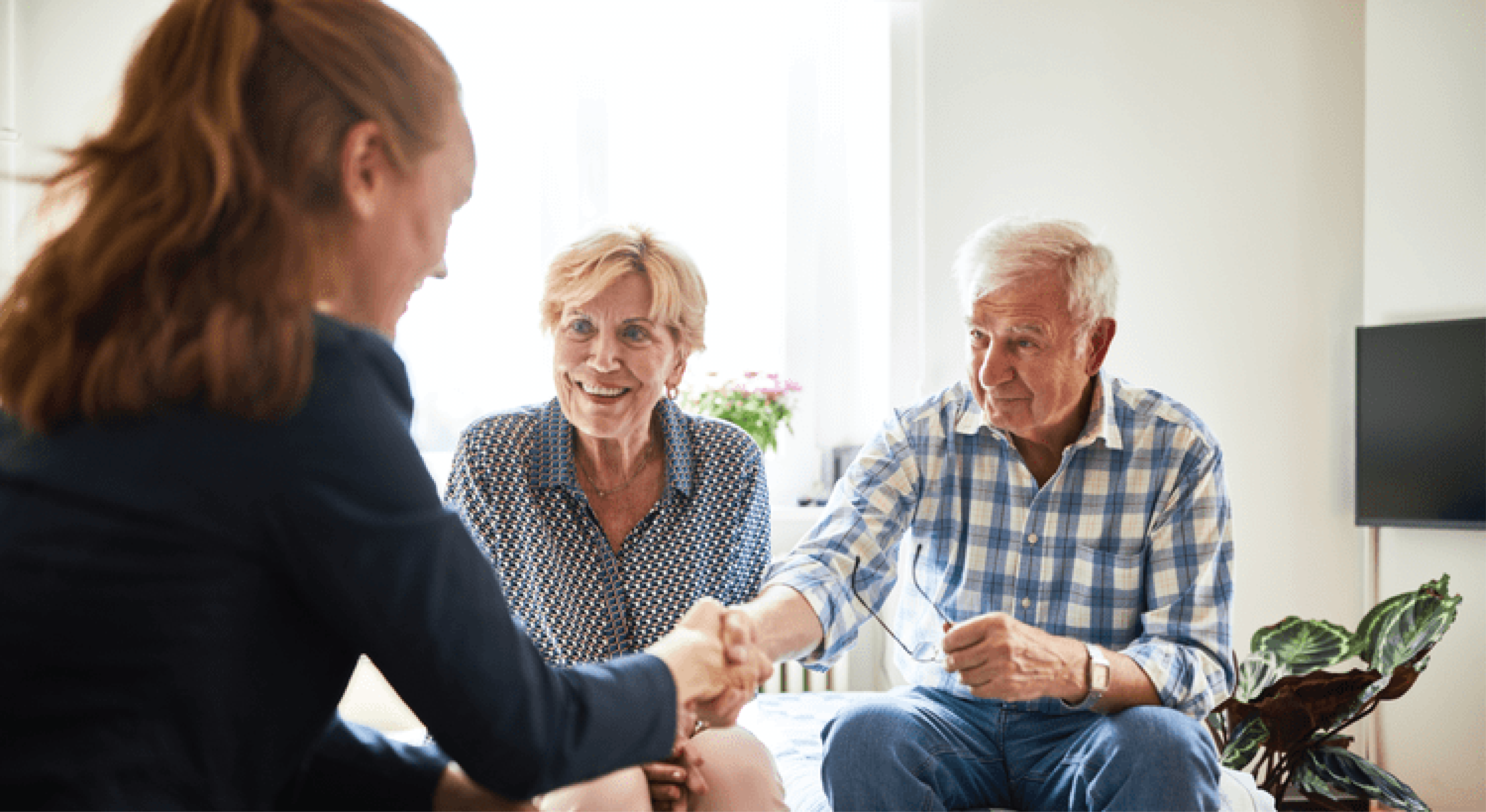 Couple Working on Retirement Plans with Real Estate Agent