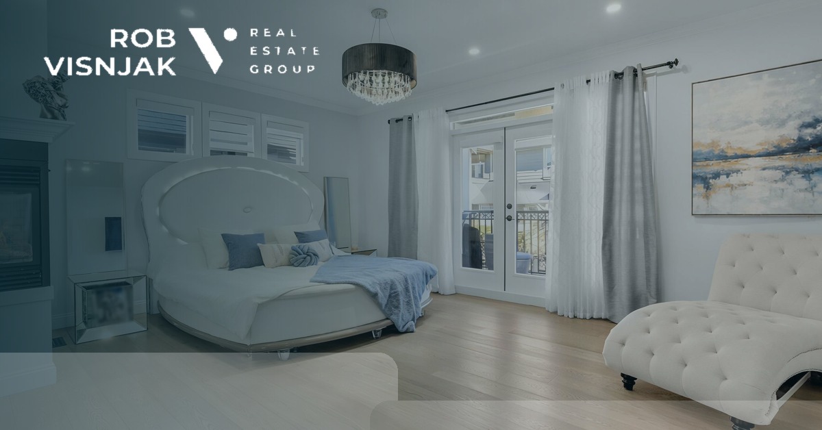 Primary bedroom with patio doors in a newer South Surrey home