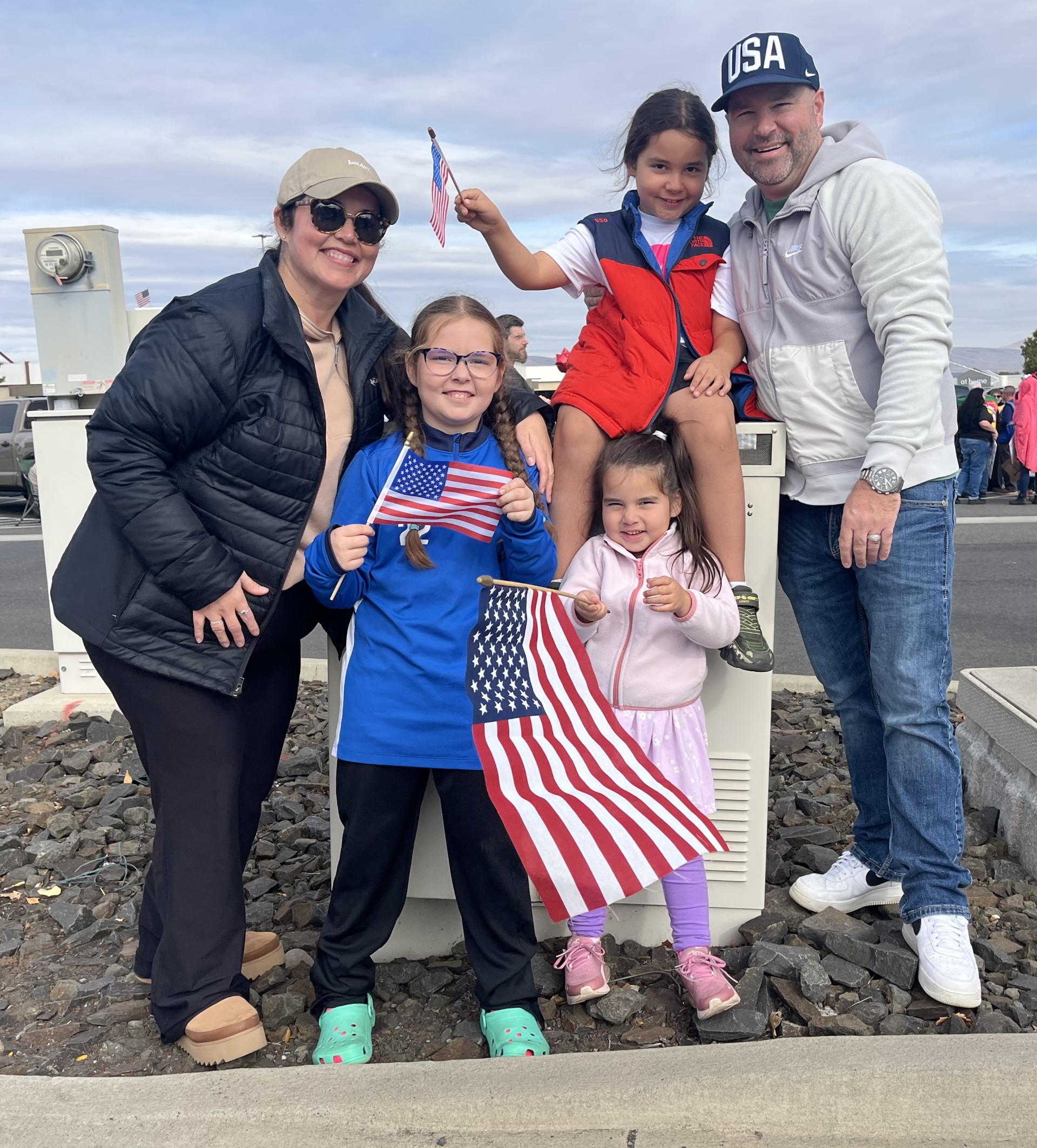 family with American flags