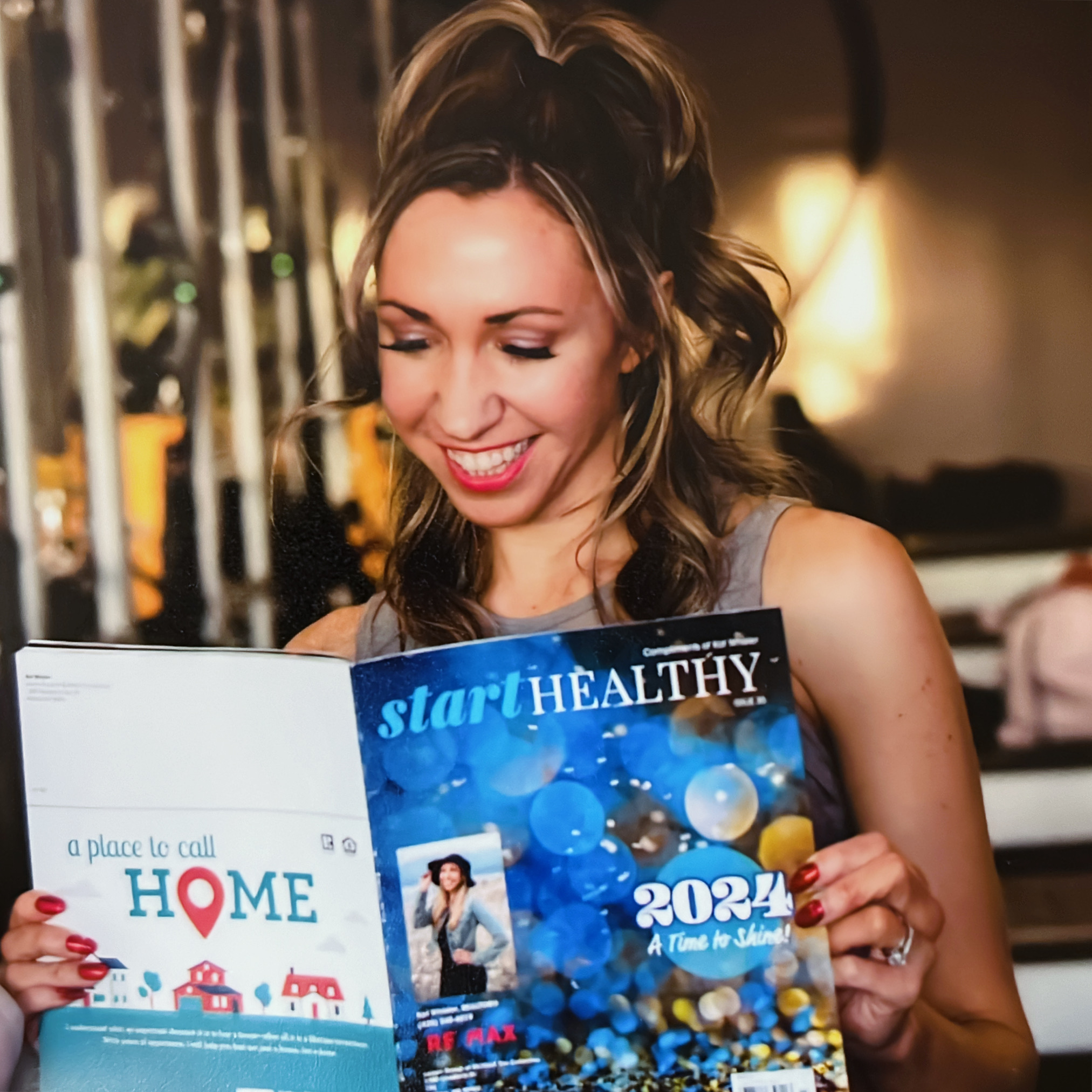 woman holding magazine 